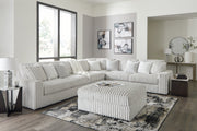 Ashley Furniture Stupendous living room set with sofa, armchair, and coffee table in a modern design, shown in a stylish living space.