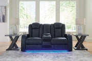 Ashley Furniture Fyne-Dyme power reclining loveseat with console, featuring plush upholstery and built-in cup holders.