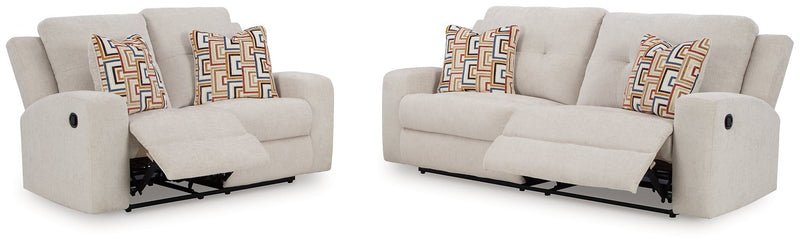 Open Ashley Furniture Danum upholstery living room set with sofa and loveseat in a modern fabric, featuring plush cushions and neutral tones.