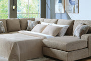 Ashley Furniture Newellen Sleeper Sectional with Chaise, modern sectional sofa with a chaise lounge, in a neutral fabric.