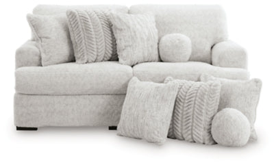 Ashley Furniture Cuddle Plush sectional sofa with soft fabric upholstery and plush cushions, ideal for cozy living rooms.