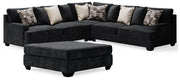 Ashley Furniture Lavernett living room set with beige upholstered sofas and armchairs arranged in a cozy seating area.