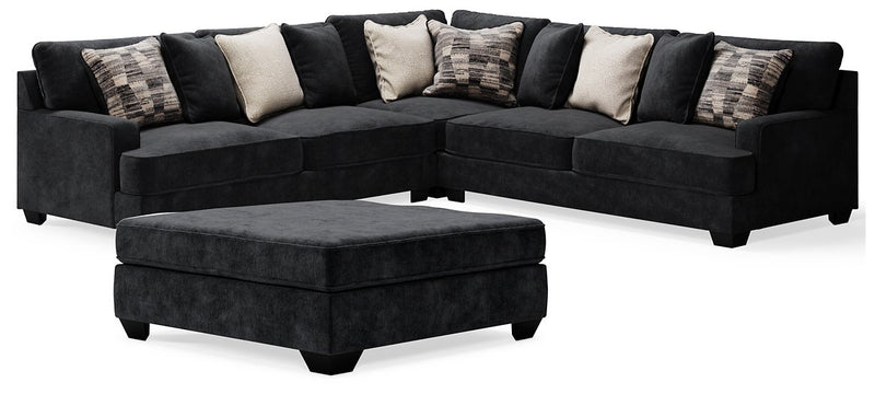 Ashley Furniture Lavernett living room set with beige upholstered sofas and armchairs arranged in a cozy seating area.