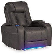 Ashley Furniture Feazada power recliner in dark upholstery, shown from an angle with the reclined seat and footrest extended.