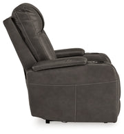Ashley Furniture Feazada Power Recliner with plush upholstery and built-in controls, shown from the side in a modern living room setting.