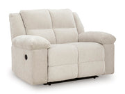 Ashley Furniture Orlen oversized recliner, plush fabric with wide seat and padded armrests, viewed from an angled closed position.