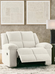 Ashley Furniture Orlen oversized recliner in open position, plush fabric, and wide seating for comfortable relaxation.