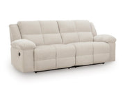 Ashley Furniture Orlen reclining sofa with plush cushions and reclining feature, shown from an angled view.