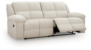 Ashley Furniture Orlen reclining sofa shown from an angled open view, featuring plush cushions and a modern design.