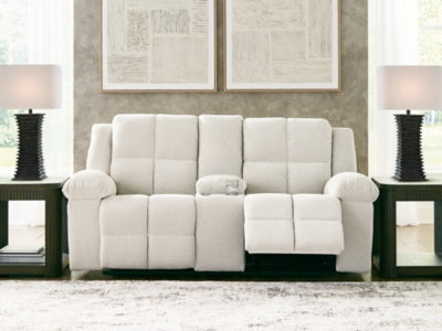 Open Ashley Furniture Orlen reclining loveseat with console, showing plush fabric, reclining seats, and built-in center console.