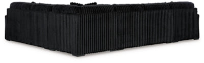 Ashley Furniture Midnight-Madness sectional with chaise, showing plush fabric, modern design, and back view.