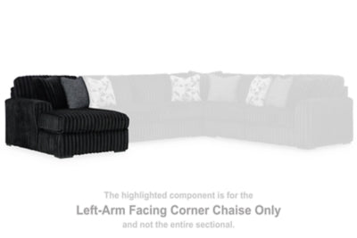 Ashley Furniture Midnight-Madness sectional with chaise, modern living room sofa with plush cushions and stylish design.