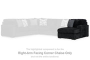 Ashley Furniture Midnight-Madness sectional with chaise, dark fabric sofa with plush cushions and extended chaise lounge.