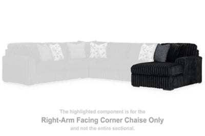 Ashley Furniture Midnight-Madness sectional with chaise, dark fabric sofa with plush cushions and extended chaise lounge.