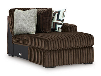 Ashley Furniture Midnight-Madness sectional with chaise, showing a stylish dark fabric sectional sofa from an angled view.