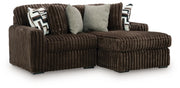 Ashley Furniture Midnight-Madness sectional with chaise, stylish living room sofa set, angled view showing dark fabric and modern design.