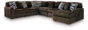 Ashley Furniture Midnight-Madness sectional with chaise, featuring plush upholstery and contemporary design in a living room setting.