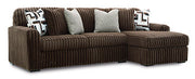 Ashley Furniture Midnight-Madness sectional sofa with chaise, featuring plush cushions and modern design, shown from an angled view.