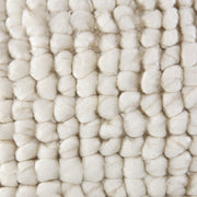 Ashley Furniture Aavie Pillow in soft, textured fabric with a stylish design, perfect for adding comfort and decor to your space.