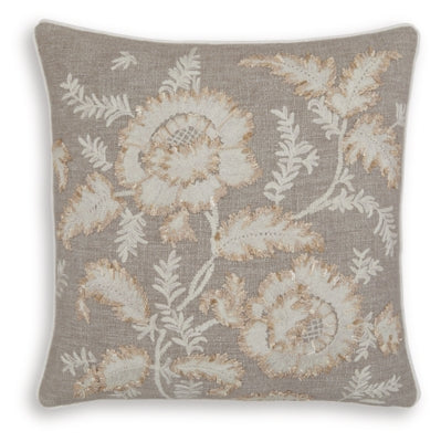 Set of four Ashley Furniture Viveka pillows with textured fabric and neutral tones, ideal for decorative sofa or bed accents.