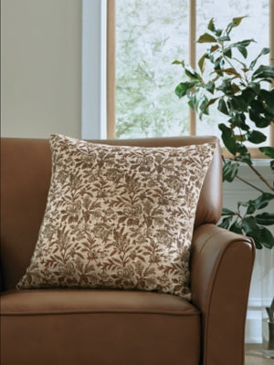 Set of four Ashley Furniture Altmontner pillows featuring neutral fabric with decorative stitching and plush filling.