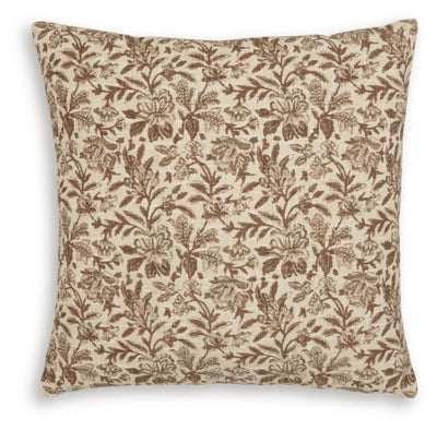 Set of four Ashley Furniture Altmontner pillows with soft fabric covers and decorative designs, ideal for living room or bedroom decor.