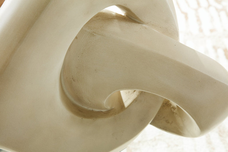 Detailed image of the Feebs Sculpture by Ashley Furniture, showcasing its artistic design and craftsmanship.