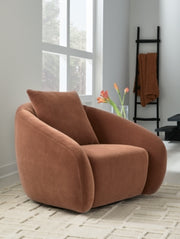 Ashley Furniture Yahya Swivel Accent Chair with plush fabric and modern design, shown in a cozy living room setting.