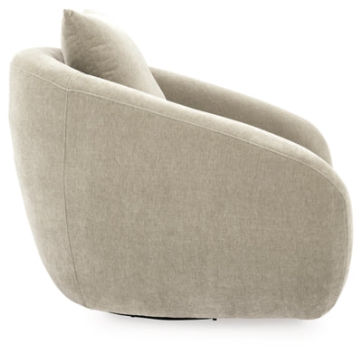 Ashley Furniture Yahya swivel accent chair with fabric upholstery and modern design, shown in a side view.