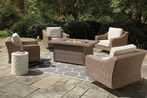 Outdoor Ashley Furniture Beachcroft fire pit table with four Nuvella swivel lounge chairs in a stylish outdoor seating set.