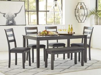 Ashley Furniture Bridson dining table with six matching chairs and bench, modern wood dining set for family gatherings.