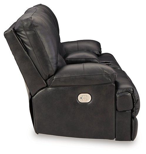 Ashley Furniture Mountainous Living Room Set with plush sofas and armchairs in a cozy, stylish living room arrangement.