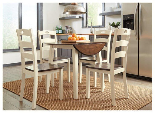 Ashley Furniture Woodanville dining room set with a wooden table and matching chairs, perfect for a stylish dining space.