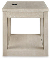 Ashley Furniture Marxhart End Table with wooden top and metal legs, modern design for living room decor.