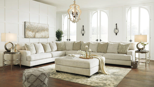 Ashley Furniture Rawcliffe living room set with sofa and armchair in a modern design, featuring neutral upholstery and wooden legs.