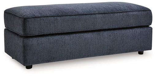 Oversized Albar Place accent ottoman by Ashley Furniture with plush fabric and tufted top, ideal for living room decor.