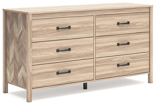 Ashley Furniture Battelle Dresser with multiple drawers and a sleek wood finish, ideal for modern bedroom storage.