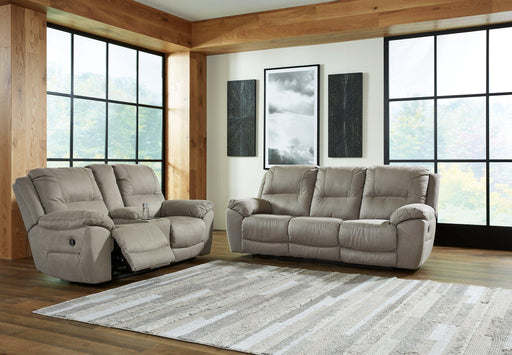 Ashley Furniture Next-Gen Gaucho living room set with sofa and armchair in a modern design, shown in a stylish living space.