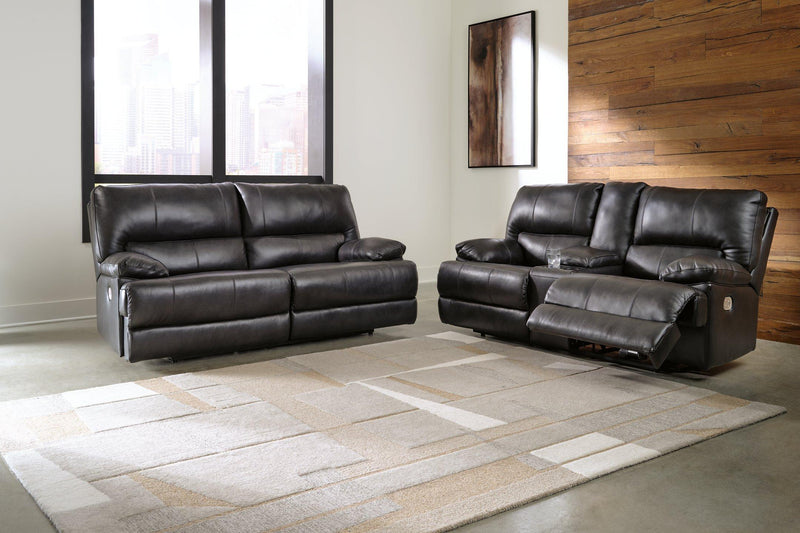 Ashley Furniture Mountainous Living Room Set featuring plush sofas and coordinating coffee table in a modern design.