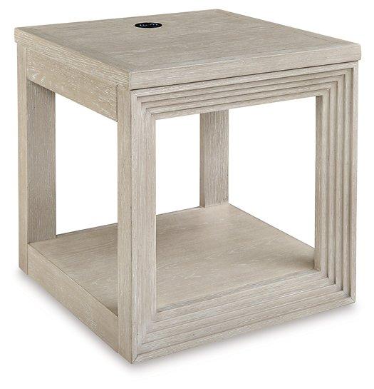 Ashley Furniture Marxhart End Table showing a modern wooden surface with a sleek design and sturdy legs.