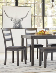 Ashley Furniture Bridson dining table with matching chairs and bench, set of 6, featuring a modern wooden design.
