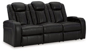 Ashley Furniture Caveman Den Power Reclining Sofa with plush cushions and reclining features, ideal for comfortable living rooms.