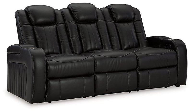 Ashley Furniture Caveman Den Power Reclining Sofa with plush cushions and reclining features, ideal for comfortable living rooms.