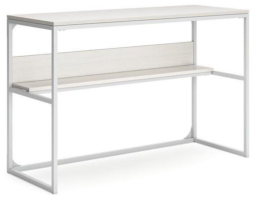 Ashley Furniture Deznee home office desk with a spacious work surface and modern design, ideal for a stylish workspace.