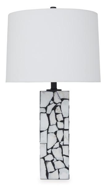 Macaria table lamp by Ashley Furniture with a sleek base and fabric shade, perfect for modern home lighting.