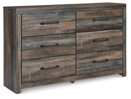 Ashley Furniture Drystan Dresser with six spacious drawers in a modern bedroom setting