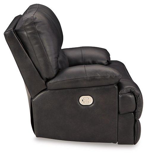 Ashley Furniture Mountainous Living Room Set featuring a cozy sectional sofa and matching armchair in a modern design.
