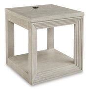 Ashley Furniture Marxhart End Table with wooden surface and sleek black metal legs, modern accent piece for living room decor.