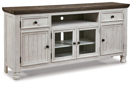 Ashley Furniture Havalance TV Stand with open shelving and storage compartments, in a modern wood finish.