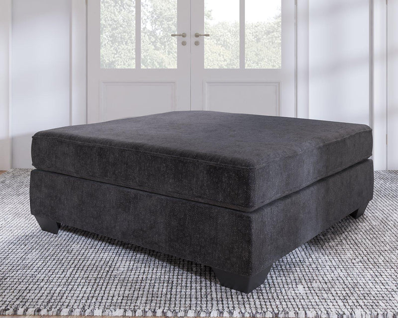 Lavernett oversized accent ottoman from Ashley Furniture with plush fabric and a contemporary design for living room decor.